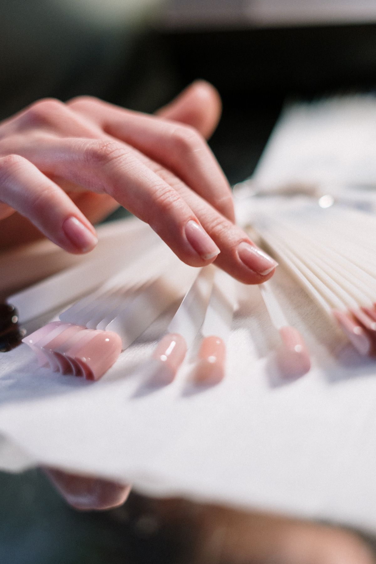 Nail extension tips being fitted, representing Gel-X extension services at Pretty Lit Nail Bar